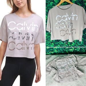 Calvin Klein Performance pink / blush cropped style top size M